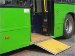 Folding ramp to enable wheelchair users board the bus